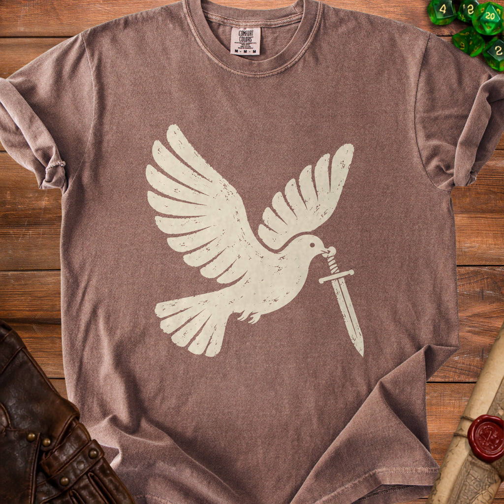 Brown t-shirt with a cream-colored distressed graphic of a dove holding a sword in its beak.