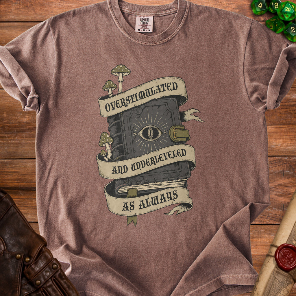 Brown t-shirt with a graphic of a book, eye, mushrooms, and text.