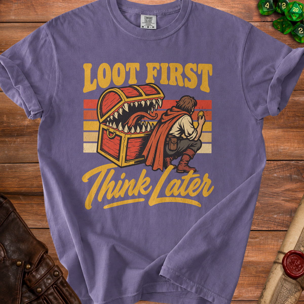 T-shirt with a monster treasure chest and text "Loot First Think Later".