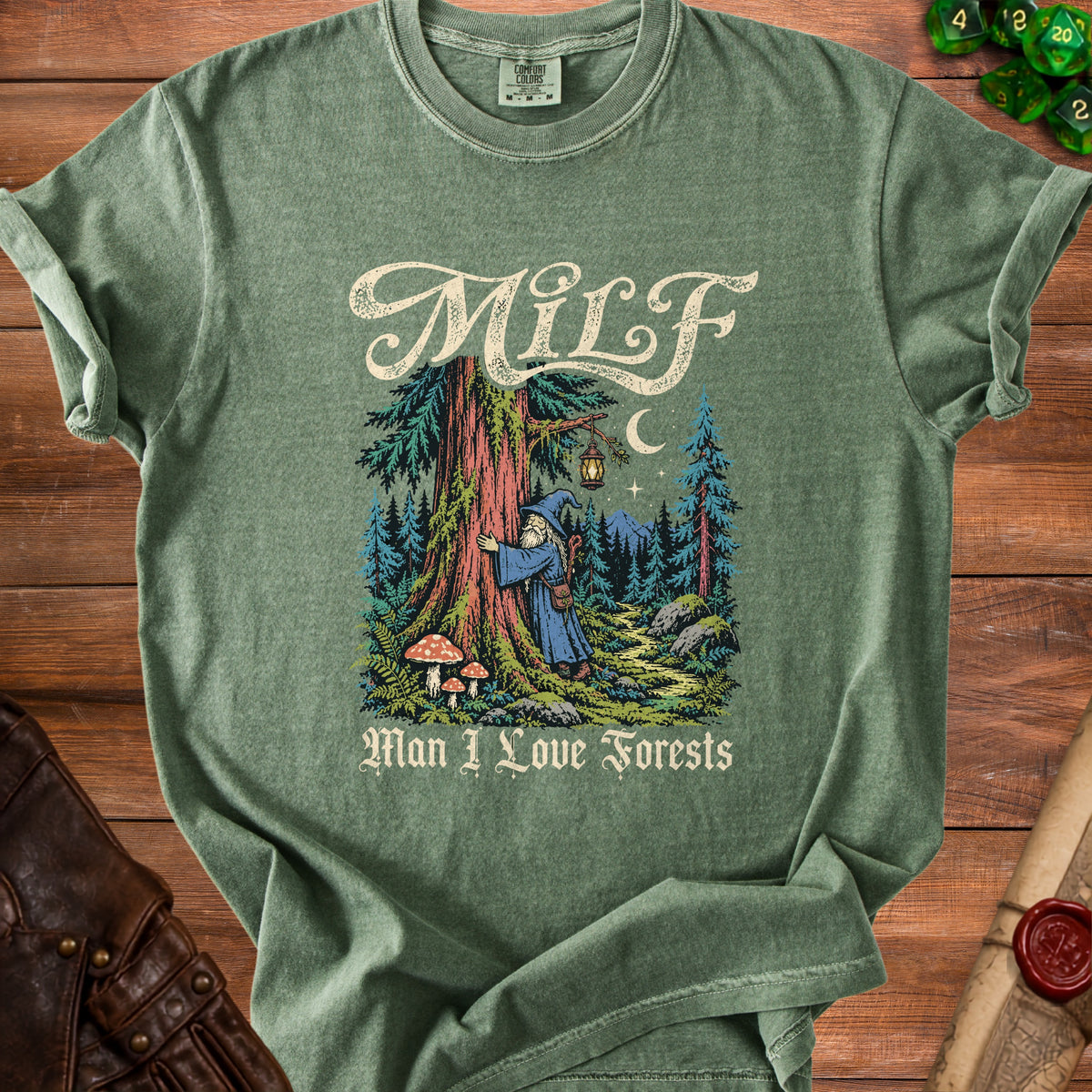 Green t-shirt with "MILF" and "Man I Love Forests" text and forest graphic.