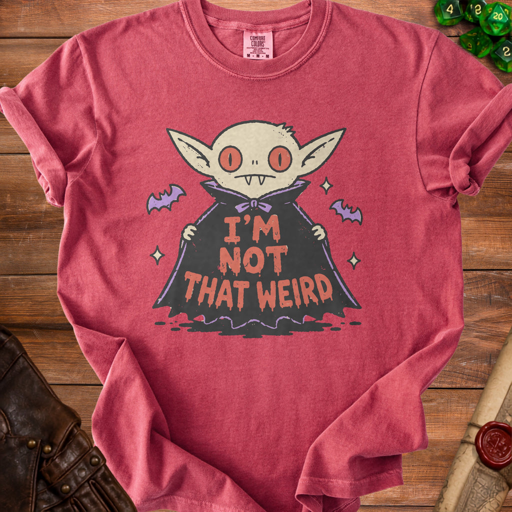 Red t-shirt with cartoon vampire graphic and text "I'm Not That Weird".
