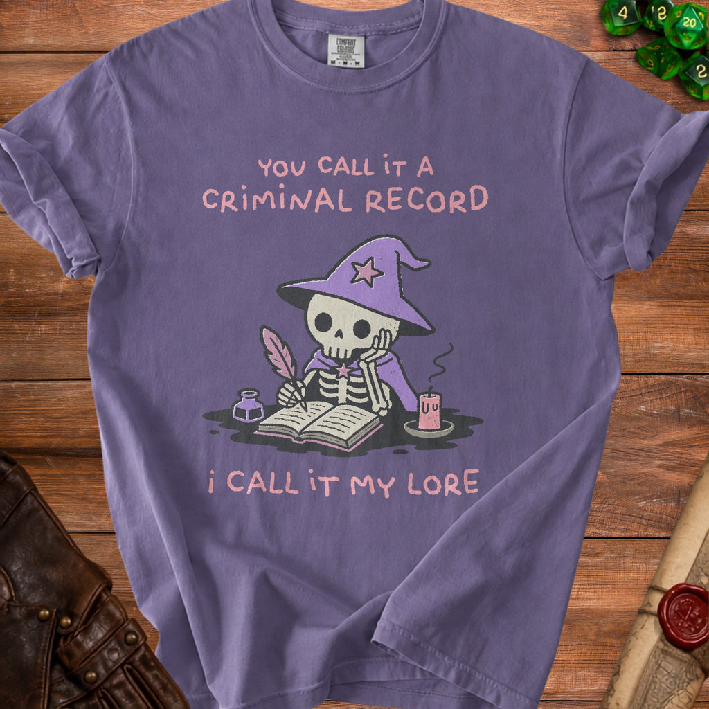 Purple t-shirt with skeleton wizard writing, "You call it a criminal record, I call it my lore."
