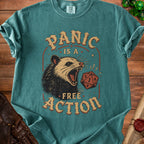T-shirt with a graphic of a screaming opossum and the words "PANIC IS A FREE ACTION."