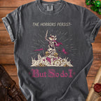 Grey t-shirt with "THE HORRORS PERSIST-" and mouse warrior graphic.