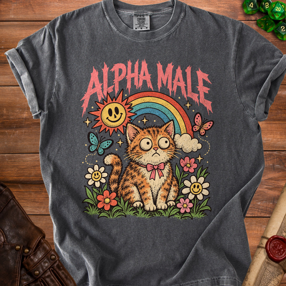T-shirt with "ALPHA MALE" text, a cat, rainbow, sun, and butterflies.