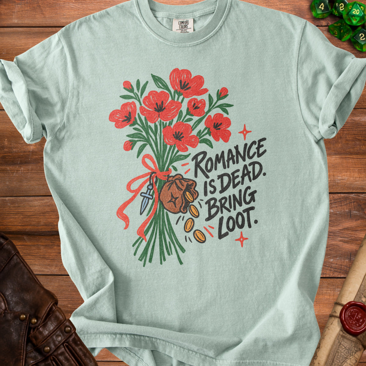 Light blue t-shirt with red flowers, loot bag, and text "Romance is dead. Bring loot."