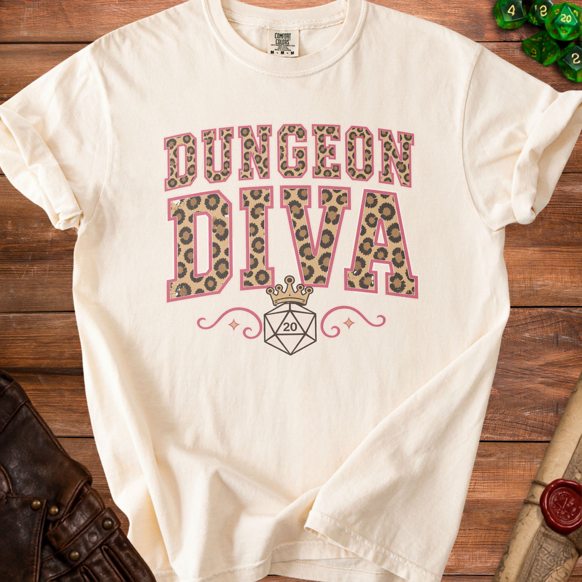 Cream t-shirt with "Dungeon Diva" text, leopard print, and a d20 die.