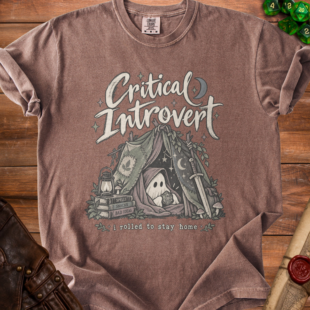 Brown t-shirt with a ghost in a tent graphic and "Critical Introvert" text.