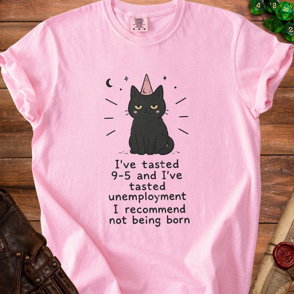 Pink t-shirt with a black cat wearing a party hat and the text "I've tasted 9-5 and I've tasted unemployment I recommend not being born."