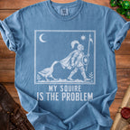 Blue t-shirt with a knight being pulled by a goose, text "MY SQUIRE IS THE PROBLEM".