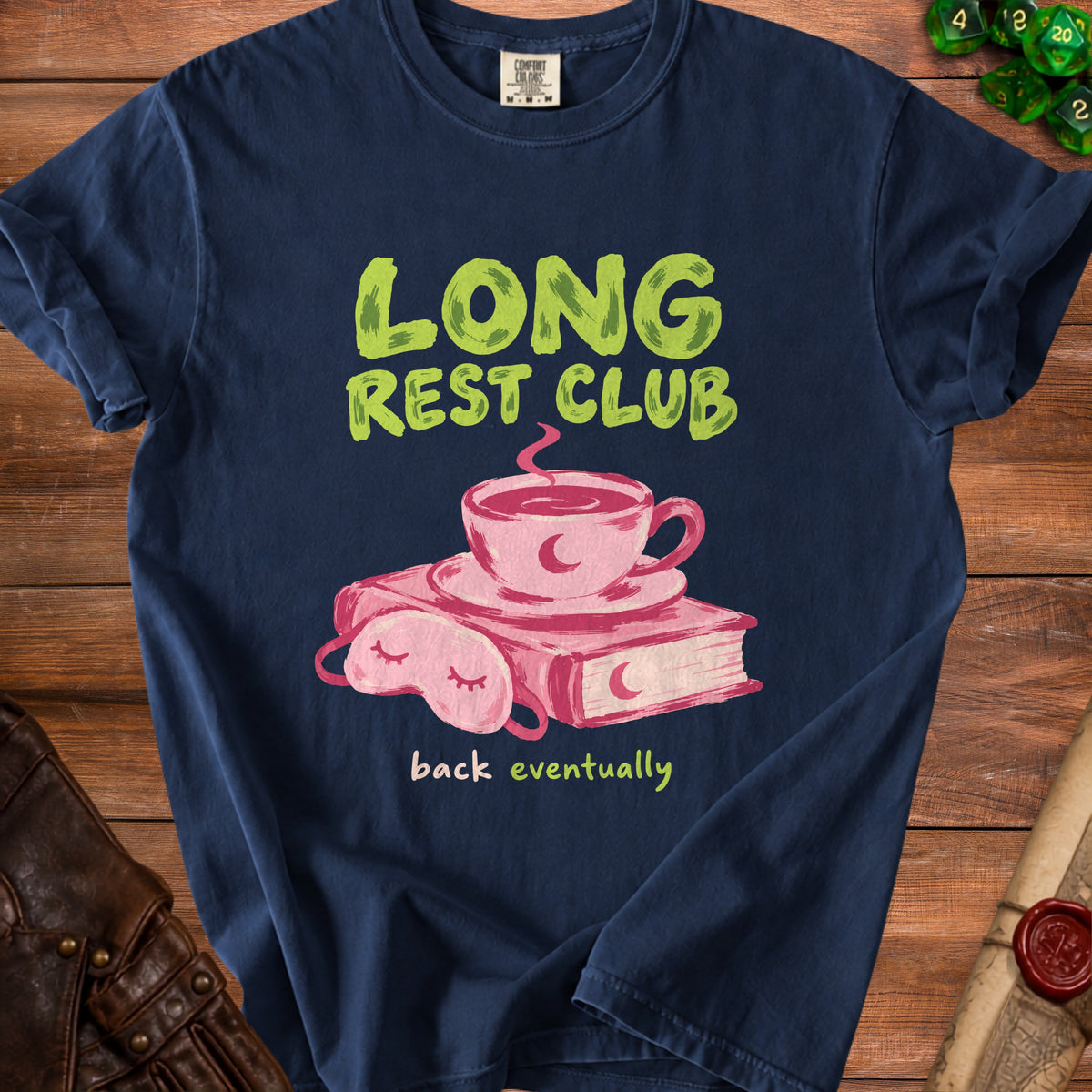 Navy t-shirt with "LONG REST CLUB back eventually" text and a book, cup, and sleep mask.