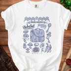 White t-shirt with a graphic of "Goblin valuables" and various items, including a crown, bag, and knife.
