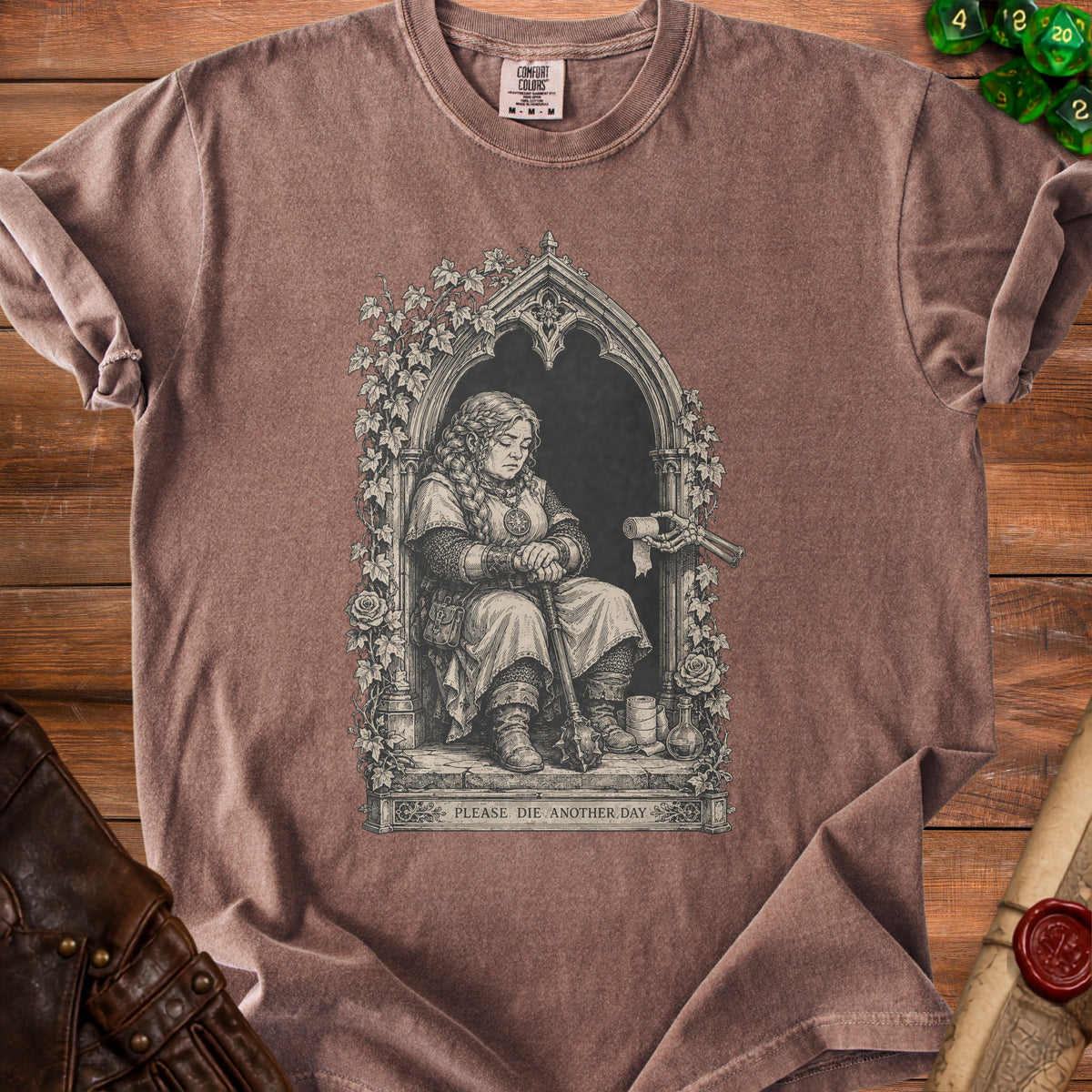 Brown t-shirt with graphic of a seated warrior and text "PLEASE DIE ANOTHER DAY".