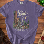 Skeleton with red hood holding coffee labeled 0%, text "Social Battery Please Wait".