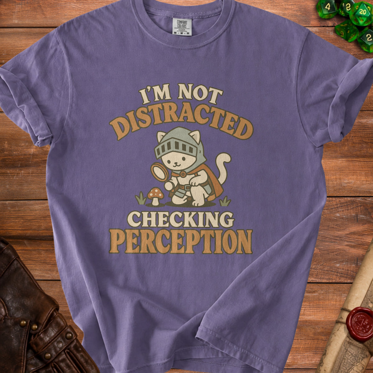 Purple t-shirt with a cartoon cat knight examining a mushroom, text reads "I'm not distracted checking perception."
