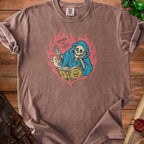 T-shirt with skeleton reading book, ghost, and flames graphic that says "Summon Me Later".