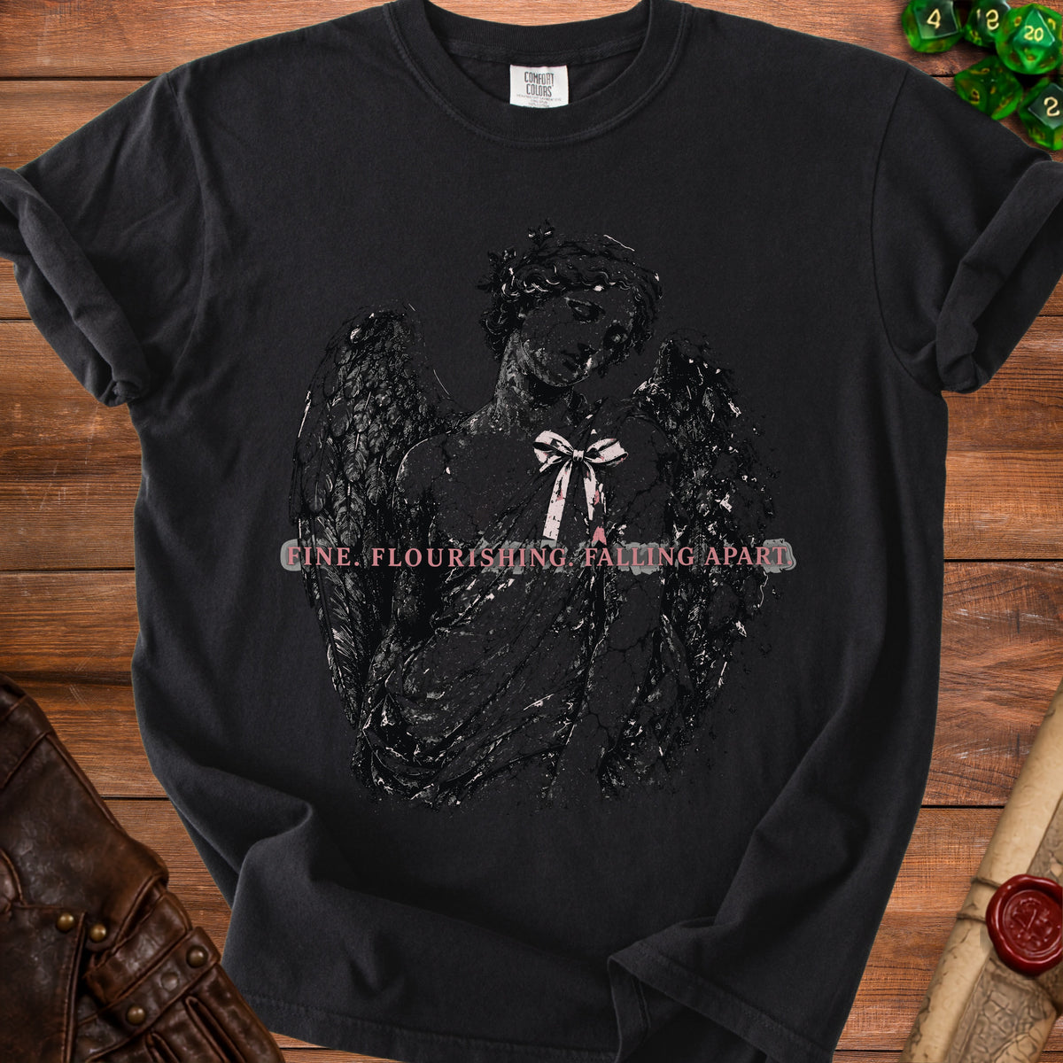 Black t-shirt with distressed angel graphic and text "FINE. FLOURISHING. FALLING APART."
