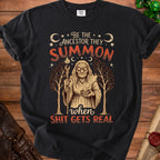 Black t-shirt with graphic: "Be the ancestor they summon when shit gets real"