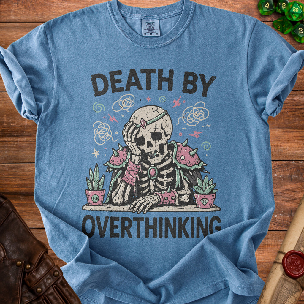 Blue t-shirt with "Death by Overthinking" graphic of a skeleton and plants.