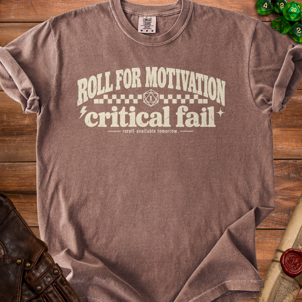 Brown t-shirt with "Roll for Motivation, Critical Fail" text and dice.