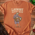 Skeleton wearing bathrobe and holding laundry basket with text "LAUNDRY never dies".