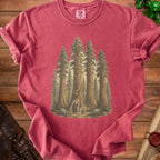 Red t-shirt with forest graphic featuring anthropomorphic trees and two figures.