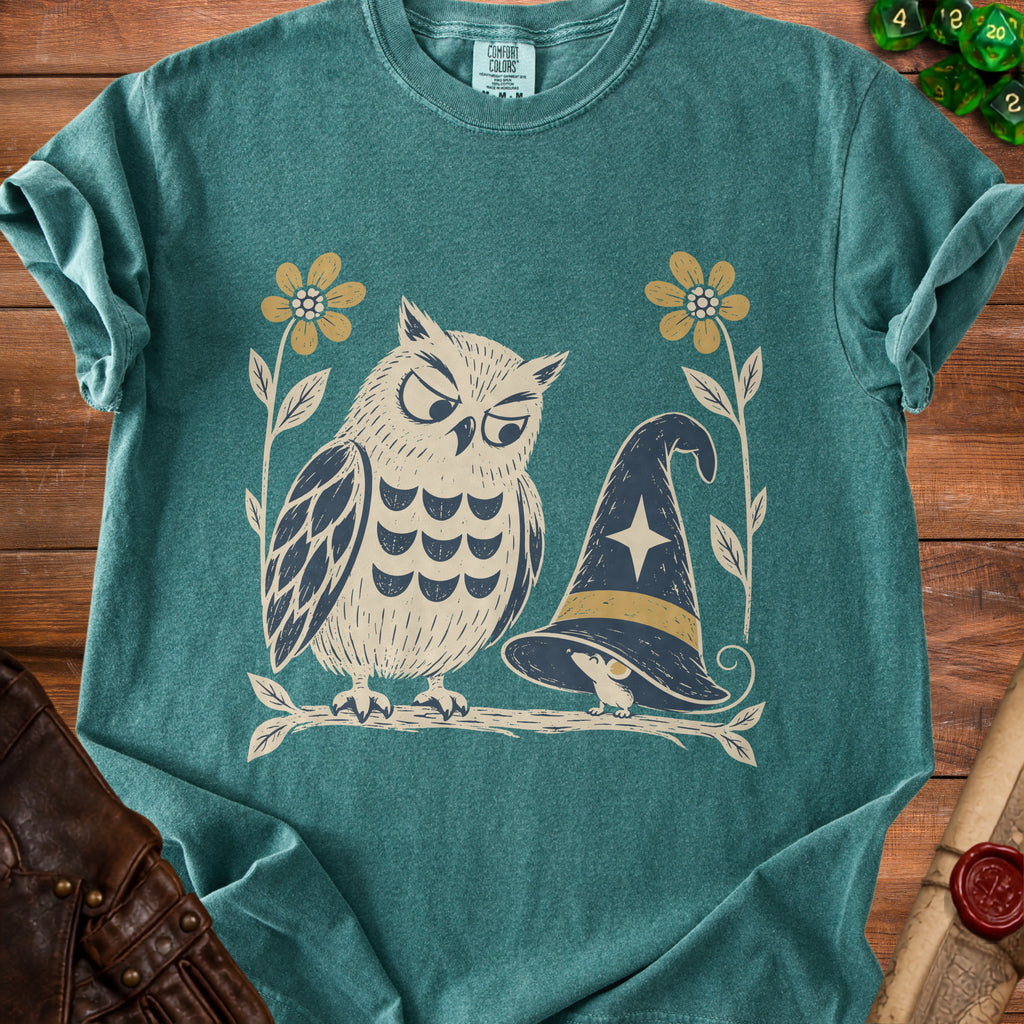T-shirt with distressed graphic of owl, mouse, witch hat, and flowers.