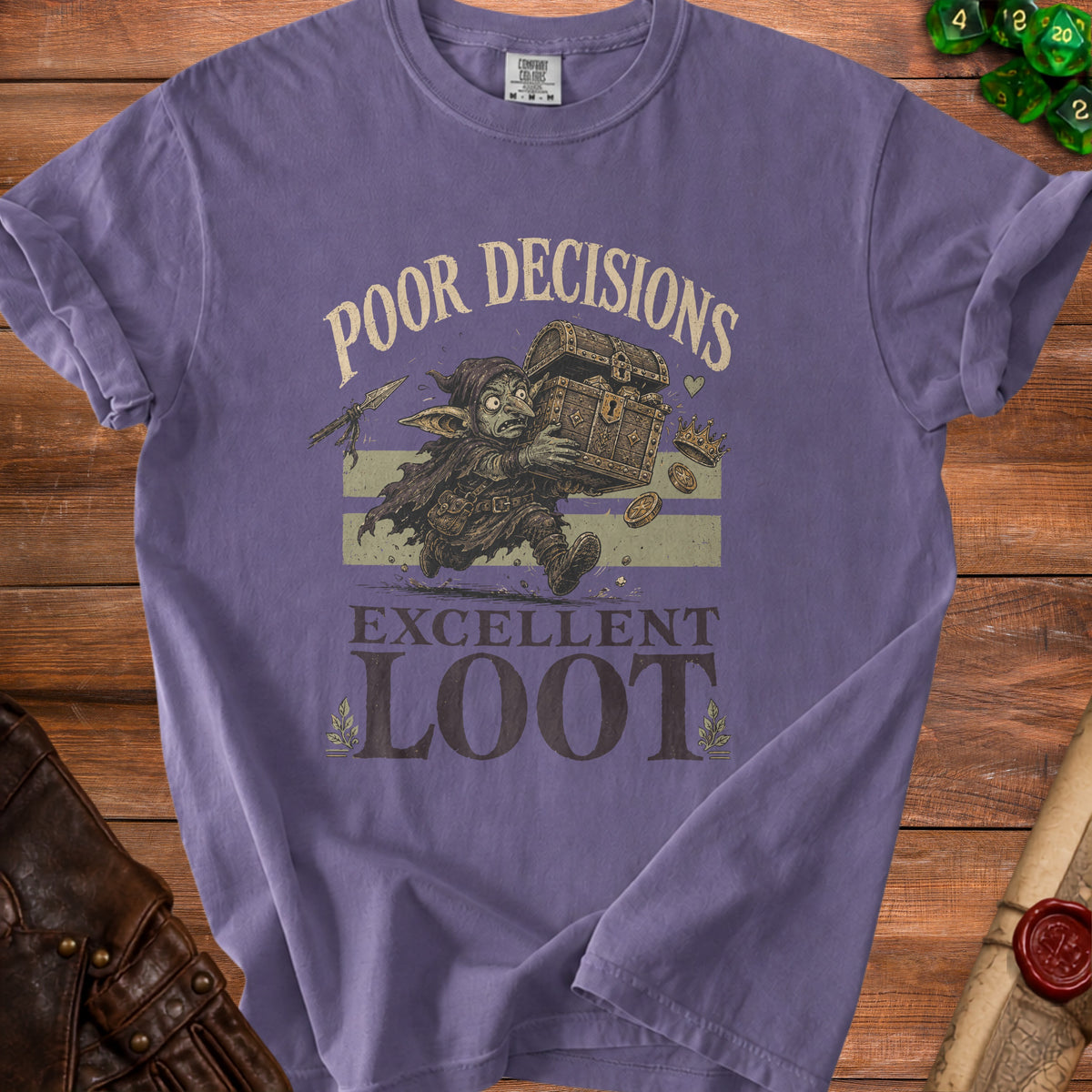 Purple t-shirt with a goblin carrying a chest, reading "Poor Decisions Excellent Loot".