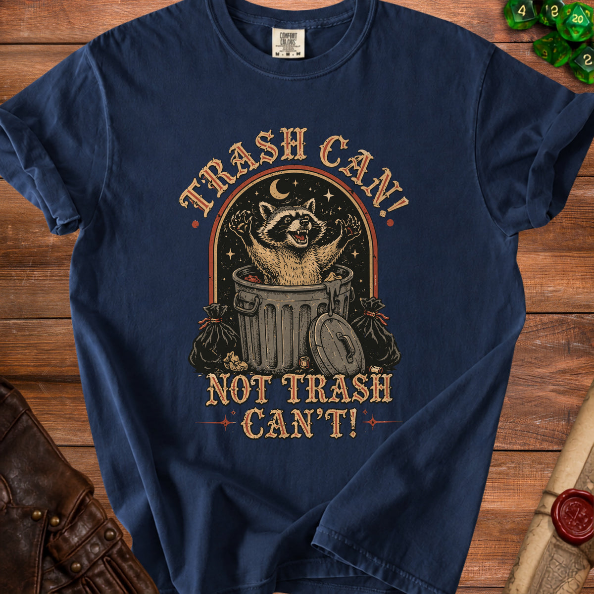 T-shirt with raccoon in trash can saying "Trash Can! Not Trash Can't!".