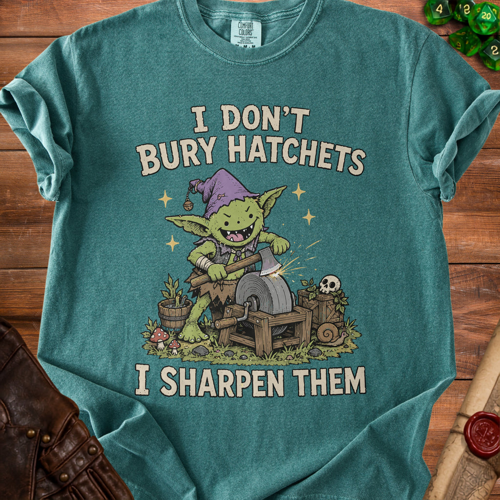 Goblin sharpening a hatchet with text "I don't bury hatchets, I sharpen them."