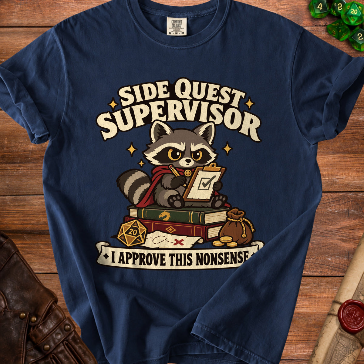 Dark blue t-shirt featuring a raccoon graphic with the text SIDE QUEST SUPERVISOR and I APPROVE THIS NONSENSE.