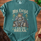 Cat in knight armor eating cheese with text "MY LIEGE I AM ON BREAK".