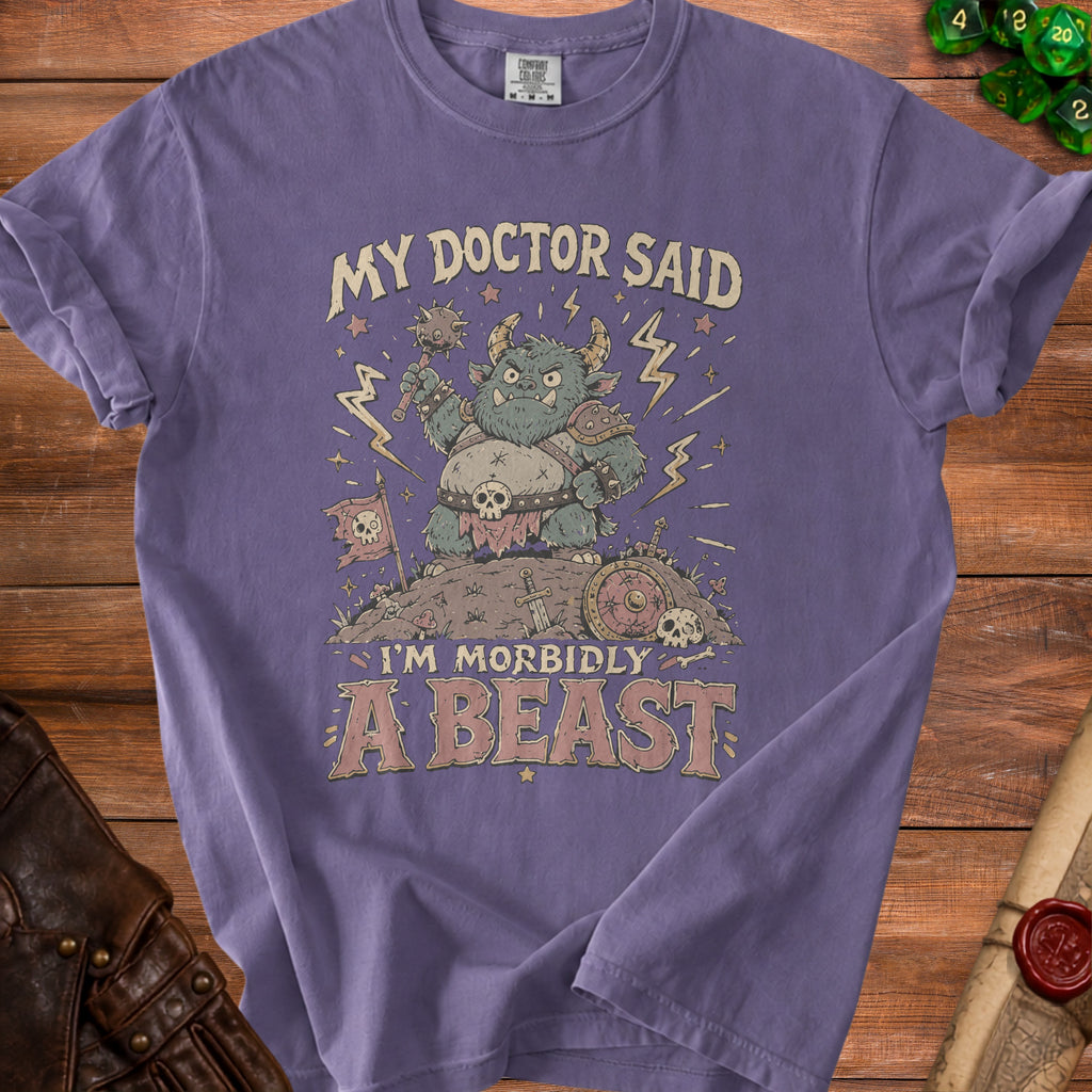 Purple t-shirt with cartoon monster holding a club and text "My doctor said I'm morbidly a beast."