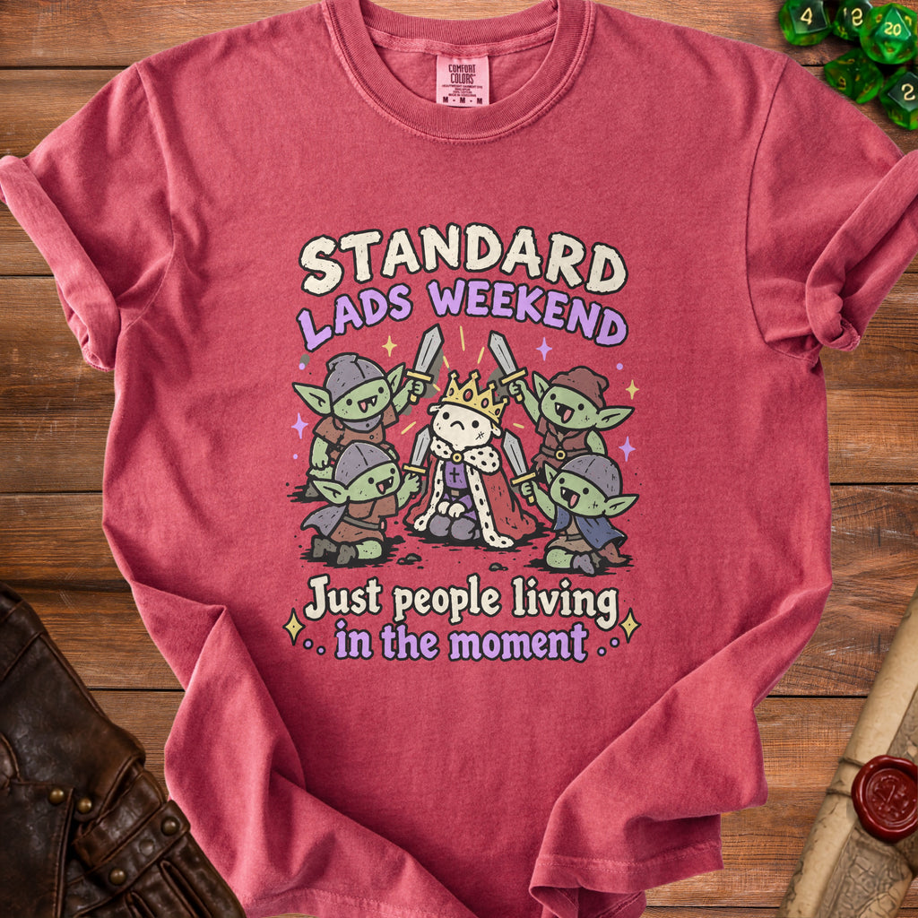 T-shirt with goblins and a sad king, reads "Standard Lads Weekend".