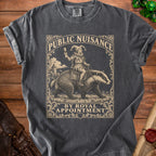 Dark grey t-shirt with a jester riding a badger graphic, text "Public Nuisance By Royal Appointment".
