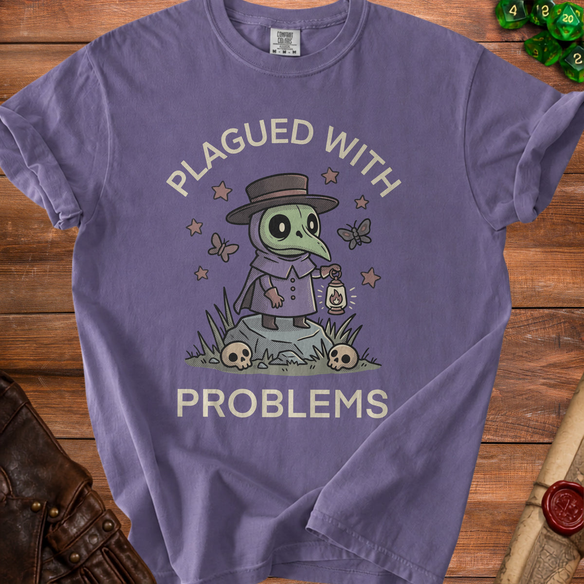 Purple t-shirt with a plague doctor character and text "PLAGUED WITH PROBLEMS".