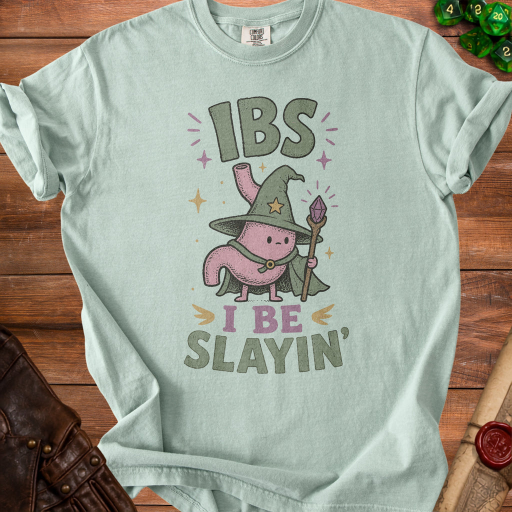 Light green t-shirt with a cartoon wizard stomach graphic that says "IBS I BE SLAYIN'".