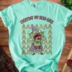 Green t-shirt with cartoon goblin and text "EVERYDAY MY HEAD GOES AAAAA".