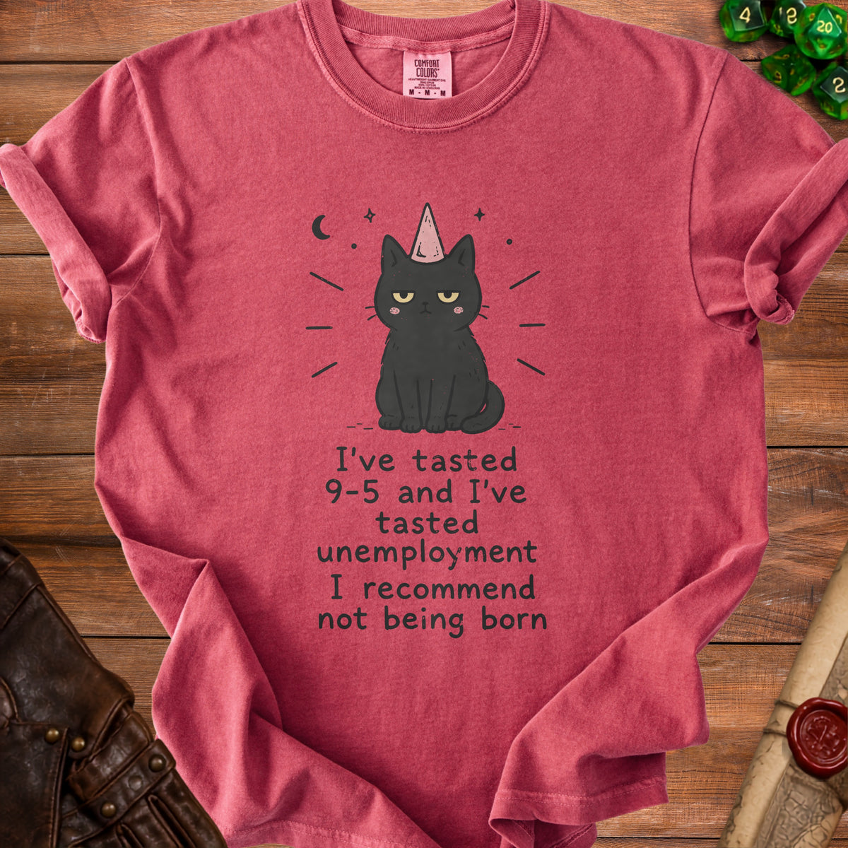 T-shirt with a grumpy black cat wearing a unicorn horn and text about life experiences.