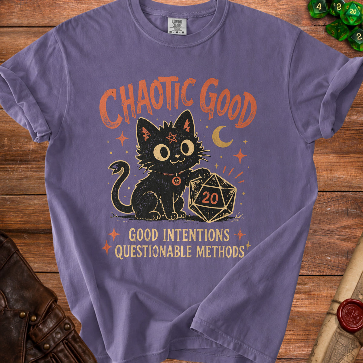 Purple t-shirt with black cat, d20, and text: Chaotic Good, Good Intentions, Questionable Methods.