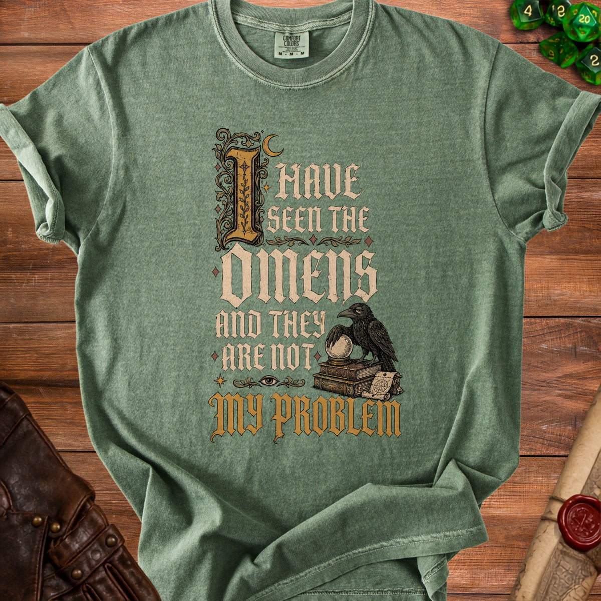 Green t-shirt with "I Have Seen The Omens And They Are Not My Problem" text.