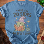 Blue t-shirt with wizard frog reading a book, "There are 20 sides to every story" text.