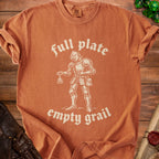 Brown t-shirt with a knight and text "full plate empty grail".