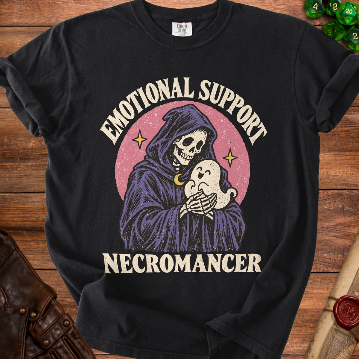 Black t-shirt with a grim reaper holding a ghost, text "Emotional Support Necromancer".