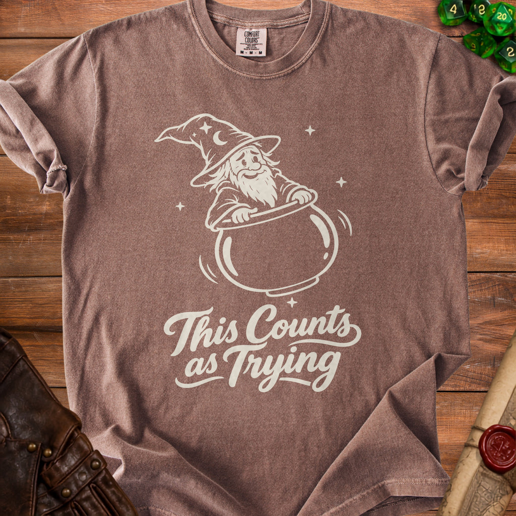 Brown t-shirt with wizard graphic and text "This Counts as Trying".
