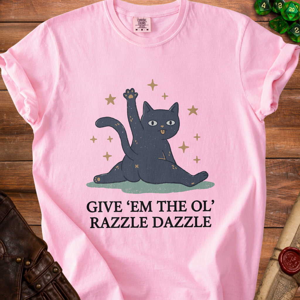 Pink t-shirt with a black cat graphic and text "GIVE 'EM THE OL' RAZZLE DAZZLE".