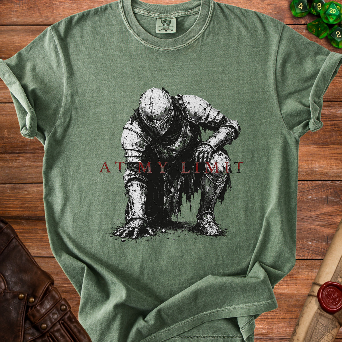 Green t-shirt with a kneeling knight graphic and text "AT MY LIMIT".