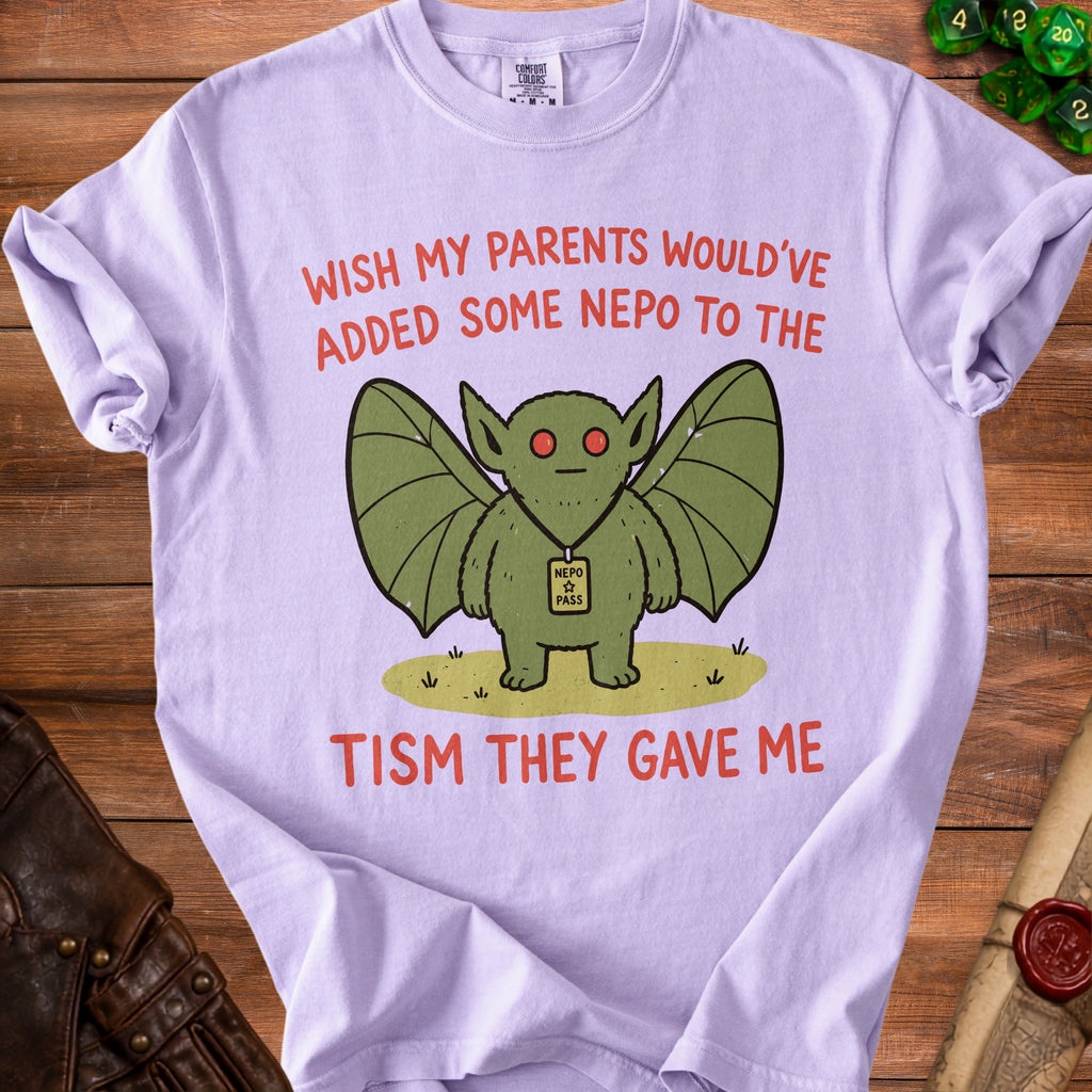 Lavender t-shirt with green monster graphic and text "Wish my parents would've added some nepo to the tism they gave me."