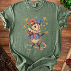 Green t-shirt with a possum in jester costume surrounded by stars.
