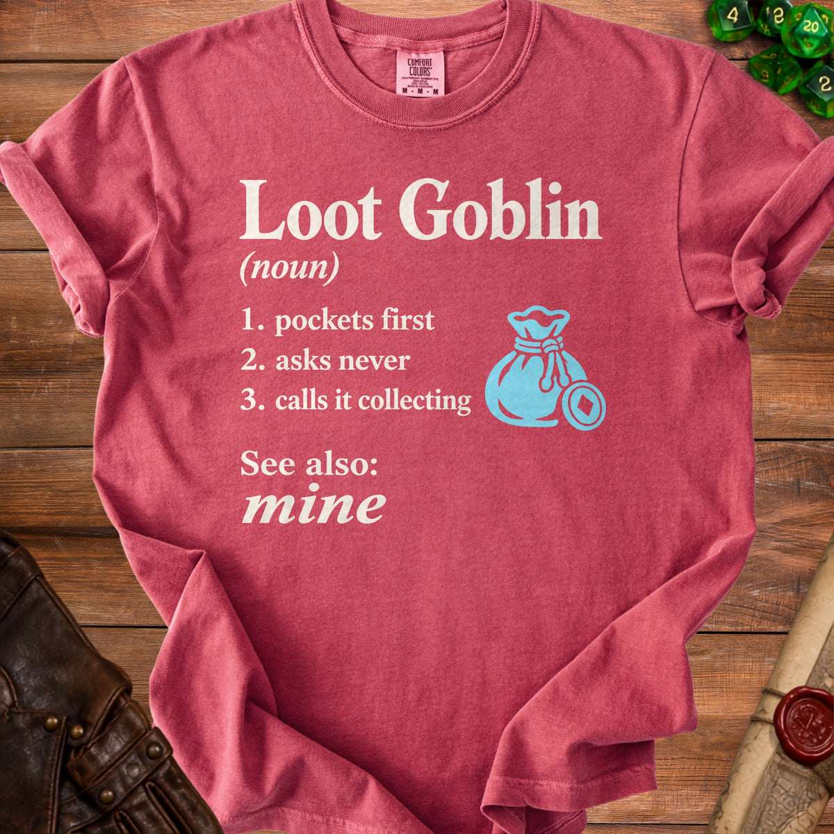 Red t-shirt with "Loot Goblin" definition and a blue money bag icon.